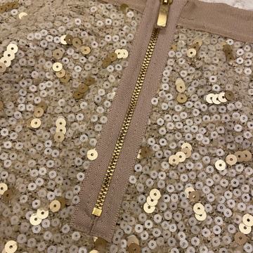 Zlatna mini suknja vel 40-42 sa šljokicama, elastinom, meka topla NOVO