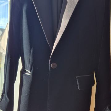 Ženski plišani, crno-sivi sako 30 €