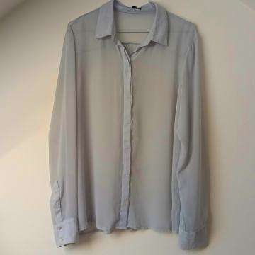 Svijetlo plava prozirna košulja 36-42