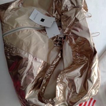 Zlatna jakna i  torba veća