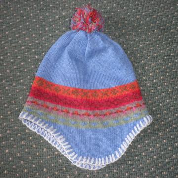 ŽENSKA TOPLA VUNENA KAPA 52