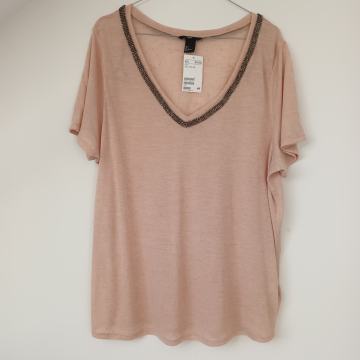 Bež majica sa svjetlucavim HM 40 novo