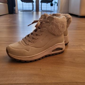 Ženske tople gležnjače Skechers Uno Rugged Fall Air, bež boje