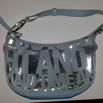 mala ženska svjetlo plava sa srebrnom torbica,20x15 cm,Italija5 eur,Zg