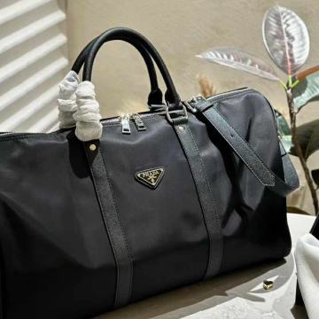 Muška, ženska torba Prada