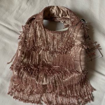 Stradivarius izvezena roza torbica