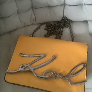 Ženske torbice Lacoste, Parfois Itd.