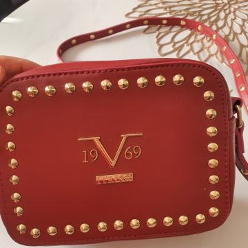 Torbica ženska, nova,manja torbica crvene boje