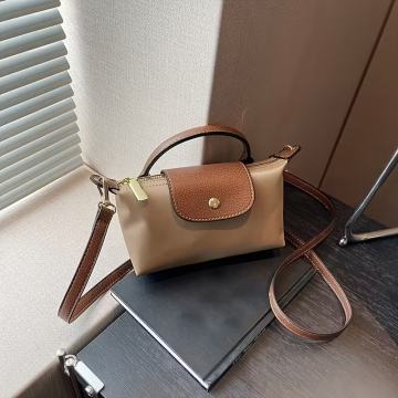 Ženska minimalistička torba preko tijela s podesivim remenom