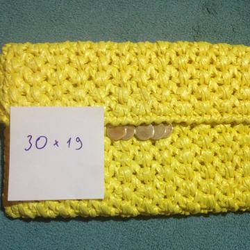 Ženska pletena torbica od kože