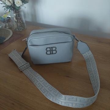 Ženska torba svijetlo siva