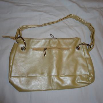 Ženska torbica krem boje 32x17 cm