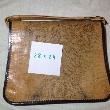 Ženska torbica od krokodilske kože