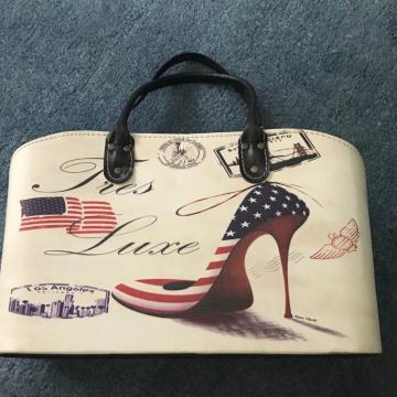 Zenska torbica s printom