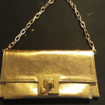 Ženska torbica zlatna nova