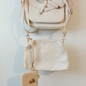 Ženski ruksak u kompletu s dvije torbicae