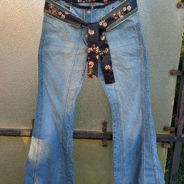 ženske i muške traperice,prsluk i šilterica