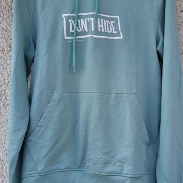 Tirkizno-plava duksa s natpisom dont hide