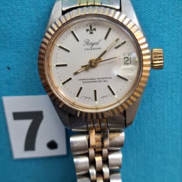 SAT.  ROYAL ž. Br-7. Sa datumom i metal narukvica. Radi. Mob