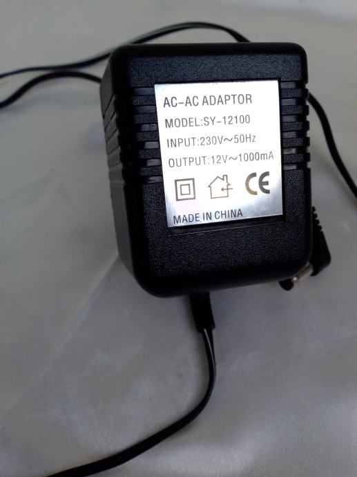 AC-AC Adaptor Model: SY- 12100 output 12V- 1000mA