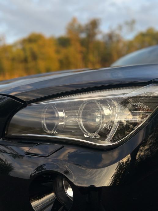 BMW X1 xDrive18d, fotografija 9