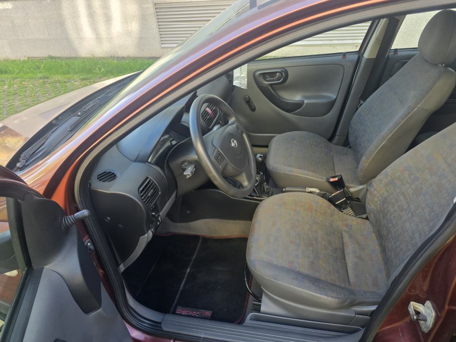 Corsa 1,0 i 12V Servo Volan,Muzika 5 vrata Serv.Knjizica Kredit-Zamj, fotografija 8