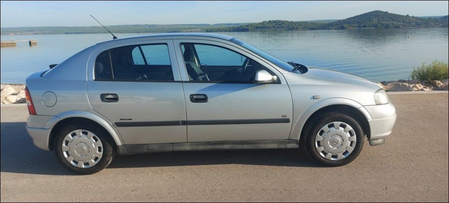 DOBRA!Astra 1,4 16V,1.VL,2009 g.KLIMA,KA NOVA,reg.7/27,MALO KM,5 VRATA, fotografija 16