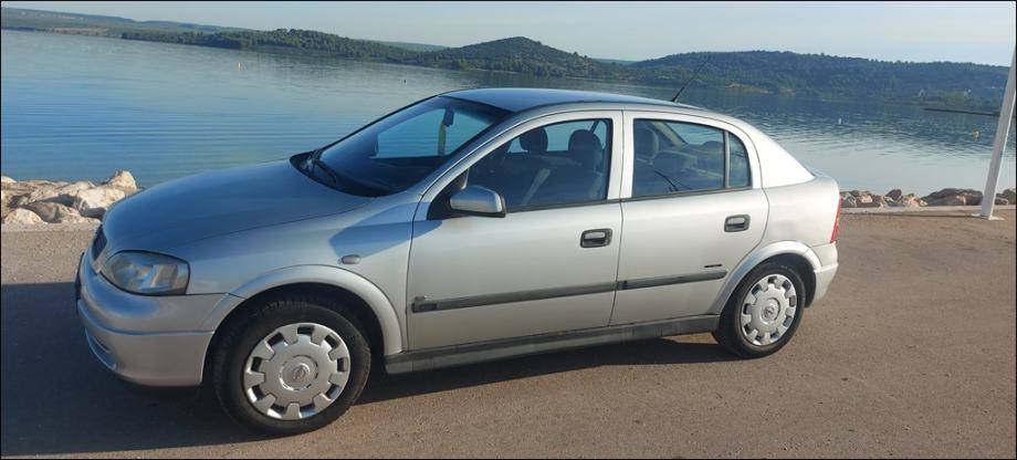 DOBRA!Astra 1,4 16V,1.VL,2009 g.KLIMA,KA NOVA,reg.7/27,MALO KM,5 VRATA, fotografija 15