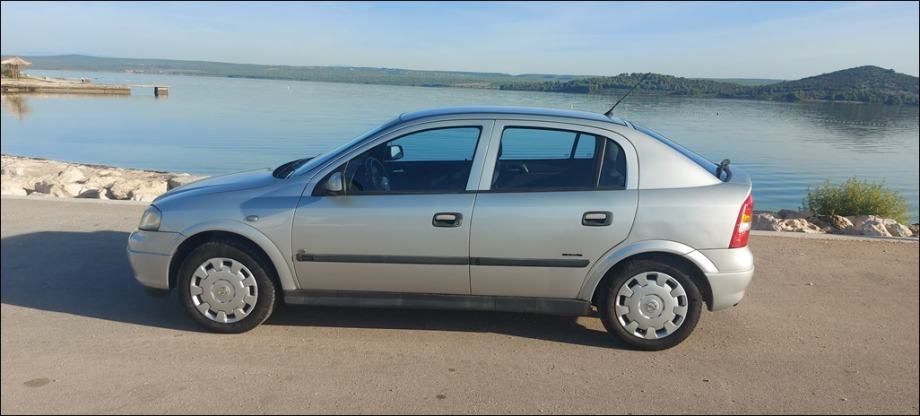 DOBRA!Astra 1,4 16V,1.VL,2009 g.KLIMA,KA NOVA,reg.7/27,MALO KM,5 VRATA, fotografija 9