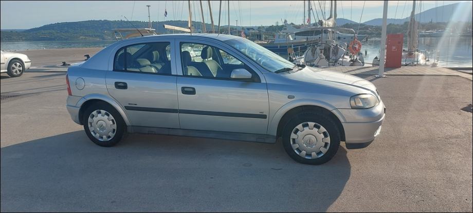 DOBRA!Astra 1,4 16V,1.VL,2009 g.KLIMA,KA NOVA,reg.7/27,MALO KM,5 VRATA, fotografija 8
