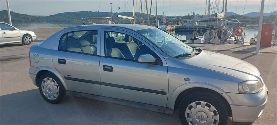 DOBRA!Astra 1,4 16V,1.VL,2009 g.KLIMA,KA NOVA,reg.7/27,MALO KM,5 VRATA, fotografija 13