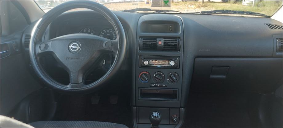 DOBRA!Astra 1,4 16V,1.VL,2009 g.KLIMA,KA NOVA,reg.7/27,MALO KM,5 VRATA, fotografija 10