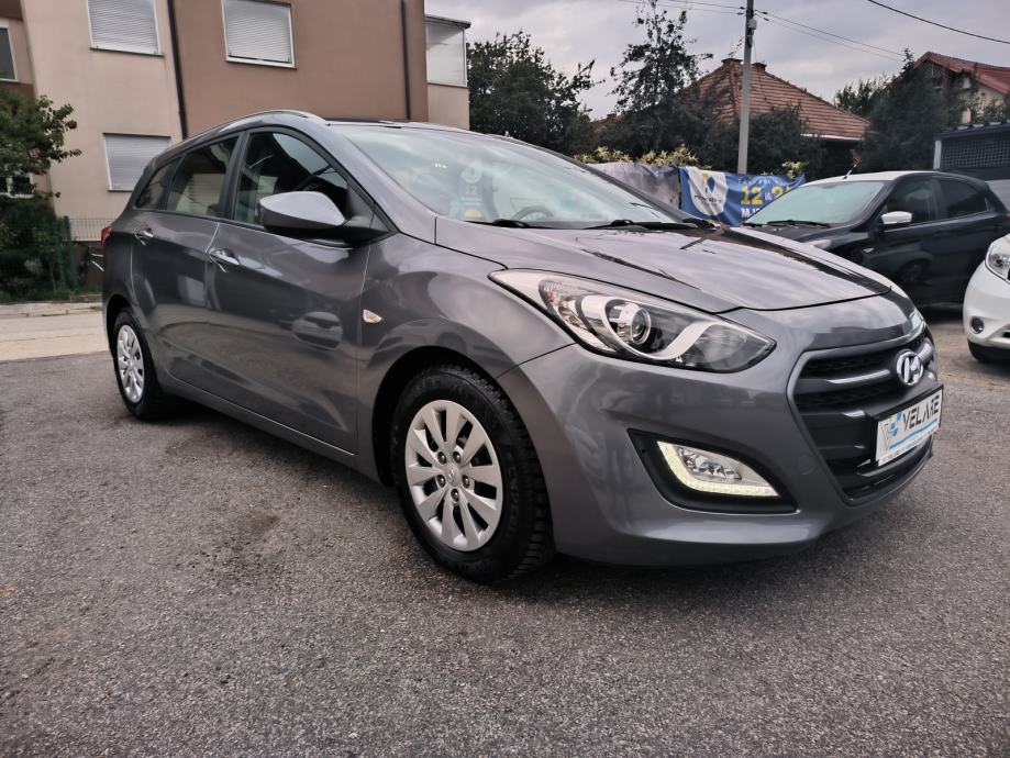 Hyundai i30 CW 1,6 CRDi, AUTOMATIK, SERVISNA, JAMSTVO, REG. 1 GODINU, fotografija 2