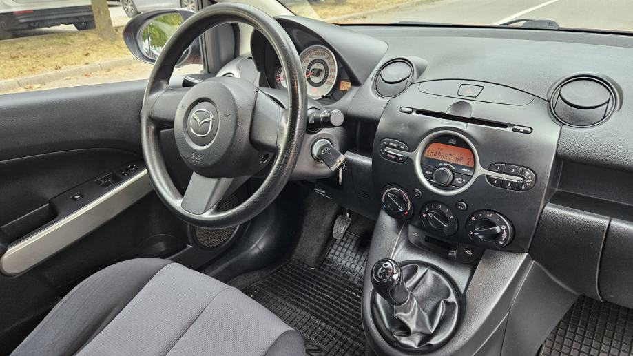 Mazda 2 1,3 i CE Pro Klima, Abs, Daljinsko, El podizači, Reg.do 6/2027, fotografija 14
