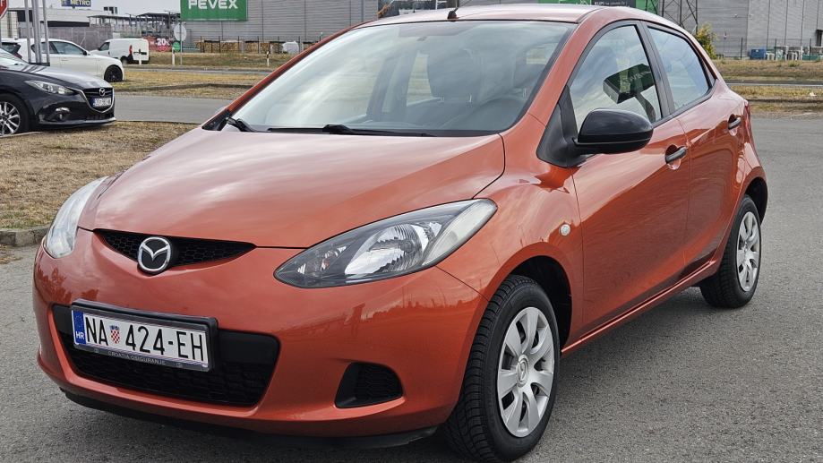 Mazda 2 1,3 i CE Pro Klima, Abs, Daljinsko, El podizači, Reg.do 6/2027, fotografija 2