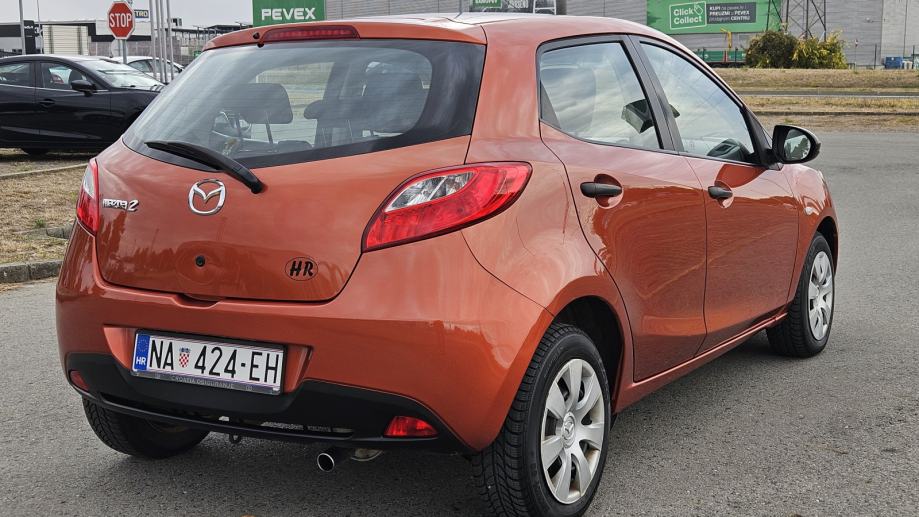 Mazda 2 1,3 i CE Pro Klima, Abs, Daljinsko, El podizači, Reg.do 6/2027, fotografija 6