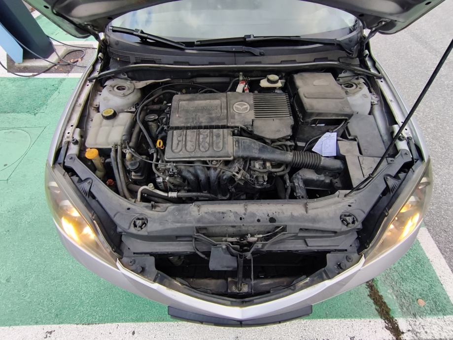 Mazda 3 Sport 1,4 i CE, fotografija 12