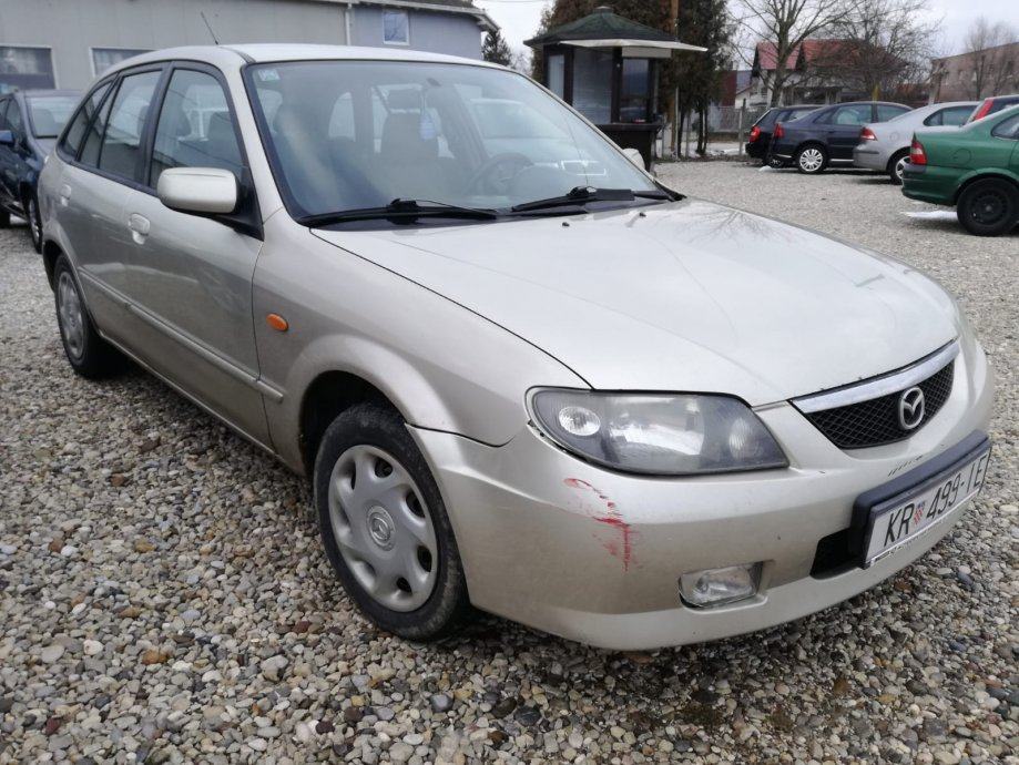 Мазда 323 2002