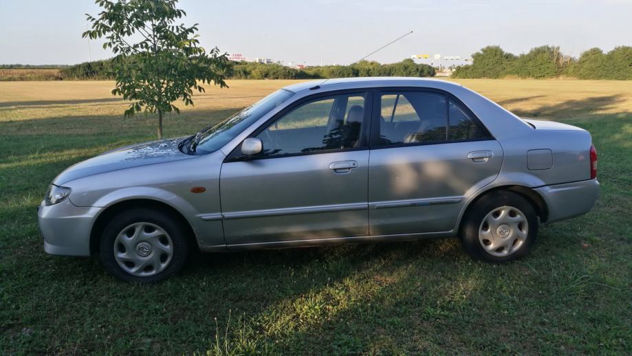 Мазда 323 2002