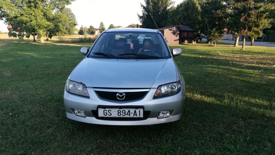 Мазда 323 2002