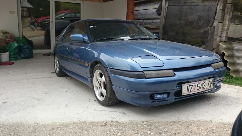 Мазда 323f gt