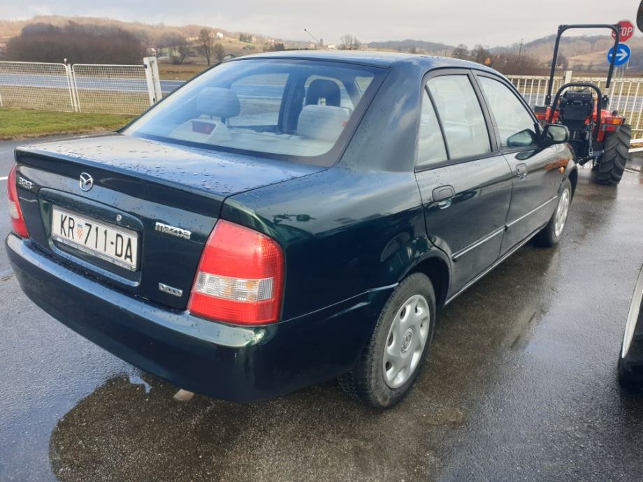 Мазда 323 седан