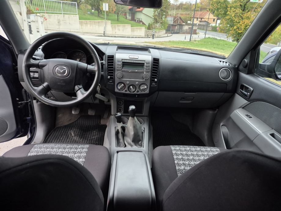 Mazda BT-50. Registrirana godinu dana, fotografija 13