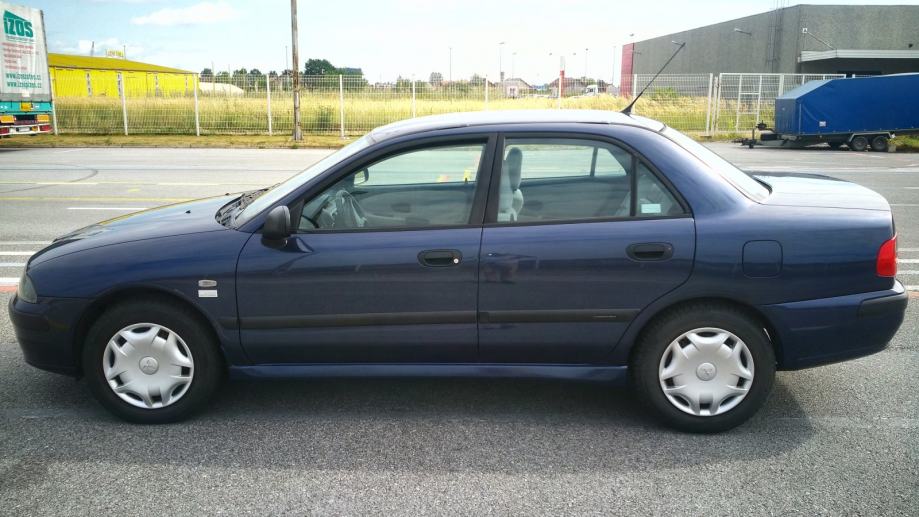 Mitsubishi carisma 2003 год