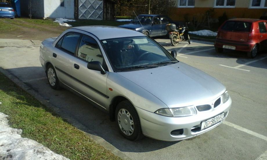 Машина mitsubishi carisma