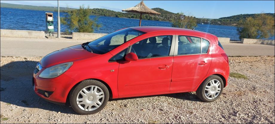 ODLIČNA! Corsa 1,2 16V,2007 g.1.VL,KA NOVA,reg.07/27,KLIMA,SERVISIRANA, fotografija 11