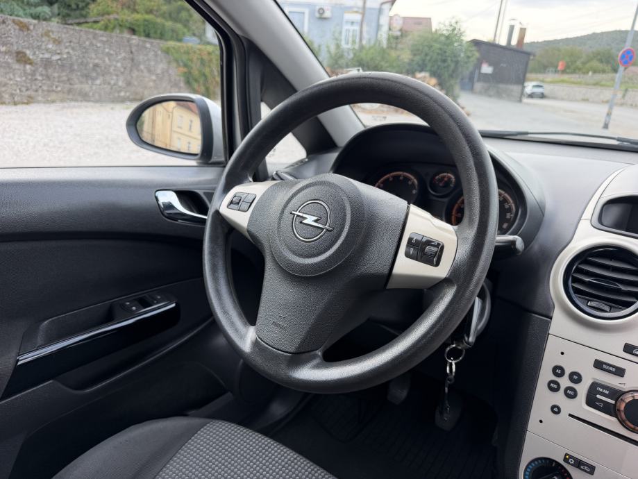 Opel Corsa 1,2 16V 1. VLASNIK - KLIMA - ALU FELGE - SUPER STANJE, fotografija 12
