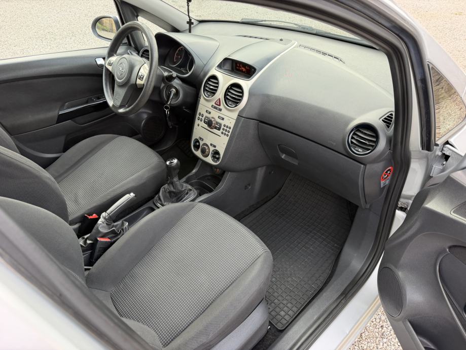 Opel Corsa 1,2 16V 1. VLASNIK - KLIMA - ALU FELGE - SUPER STANJE, fotografija 13