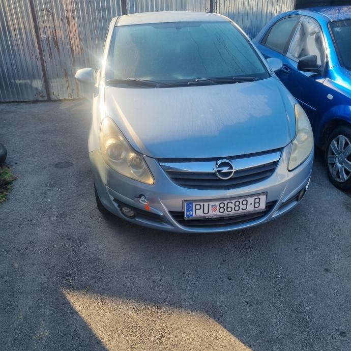 Opel Corsa 1,4 16V,otišla brtva glave, fotografija 2