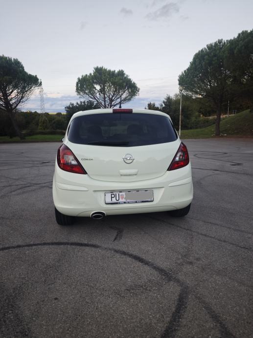 Opel Corsa 1,4 16V, alu felge, zatamnjena stakla, prvi vlasnik, fotografija 6